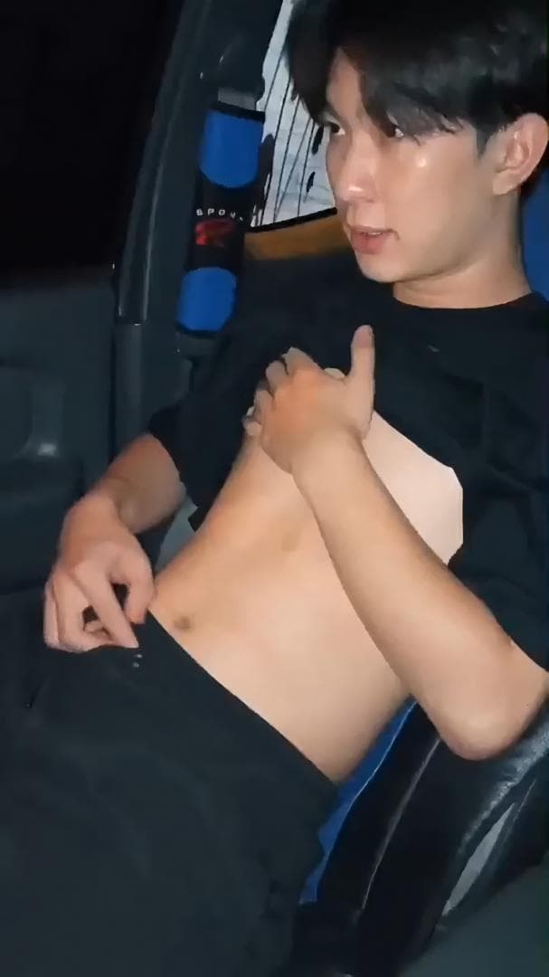  Handsome Thai guy masturbates in a car